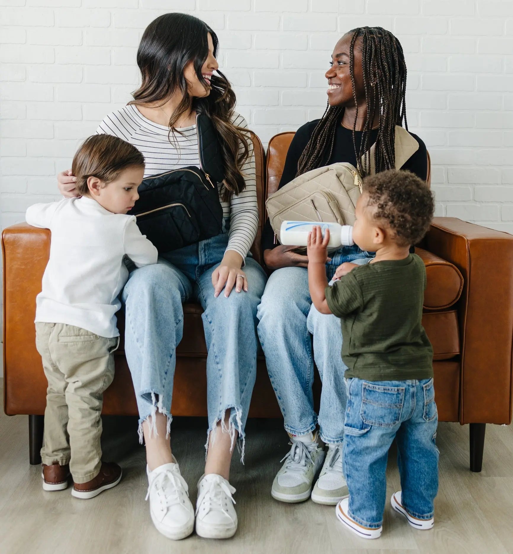 A stylish and compact mini diaper bag displayed in an elegant, quilted design—perfect for moms who need function and fashion in one.